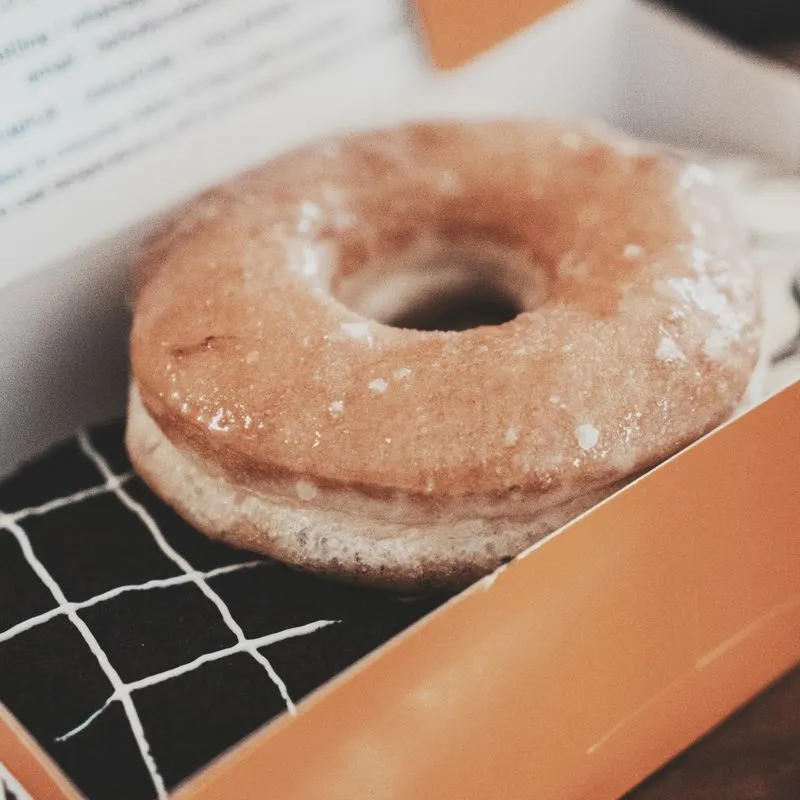 Mini crispy donut with sweet condensed milk glaze