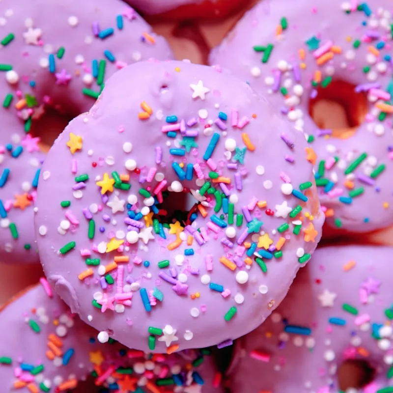 Mini crispy donut dipped in creamy purple yam (ube) dip